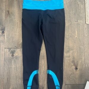 Lululemon Navy with Blue Band and back Pocket Crop Leggings